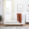 3-in-1 Modern Solid Wood Crib in White with Mid Century Style Legs in Walnut